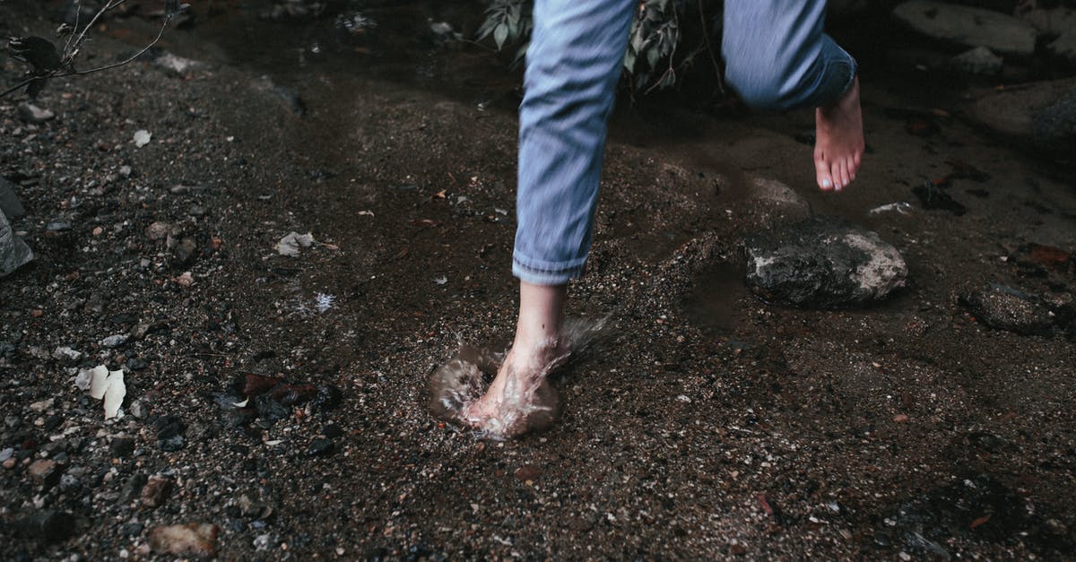 Does hopping have an advantage? - Person in Blue Denim Jeans Standing on Brown Soil