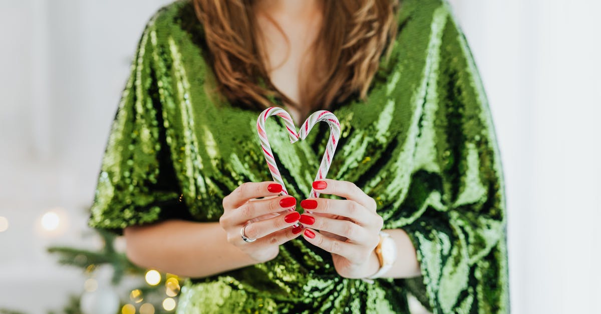 Does losing soul heart count as actual damage? [duplicate] - Woman in Green and White Floral Dress Holding Red Heart Shaped Paper Clip