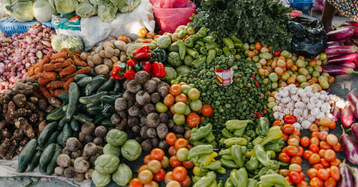 Does my second local player have a different MMR? - From above of various vegetables including pepper beets cabbage tomatoes greens potato zucchini and carrot at bazaar