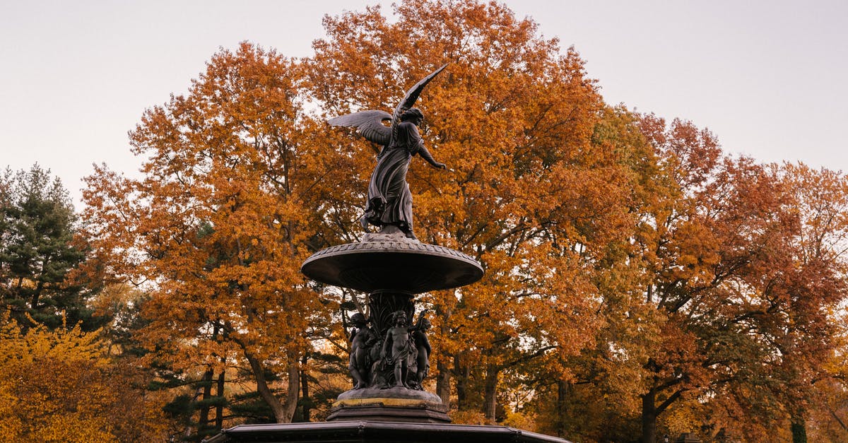 Does National visistor center affect all cities? - Fragment of Bethesda Fountain with Angel of the Waters statue placed in Central Park in New York City in America in autumn time