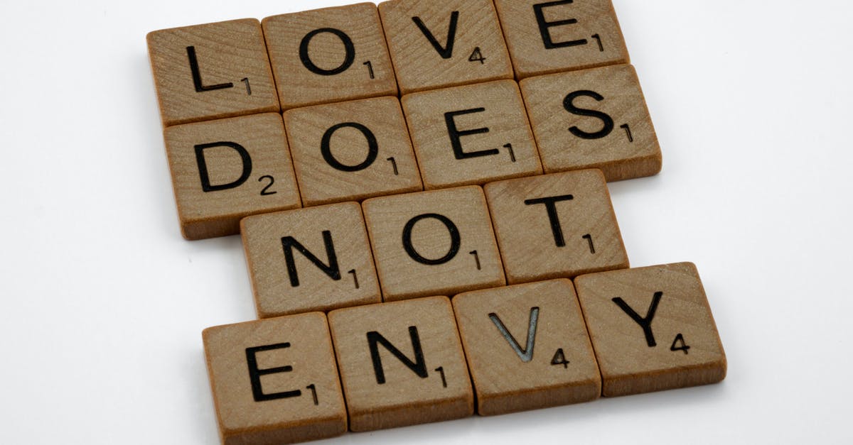 Does "Full metal jacket" synergize with "Elder Blank"? - Close-Up Shot of Scrabble Tiles on a White Surface