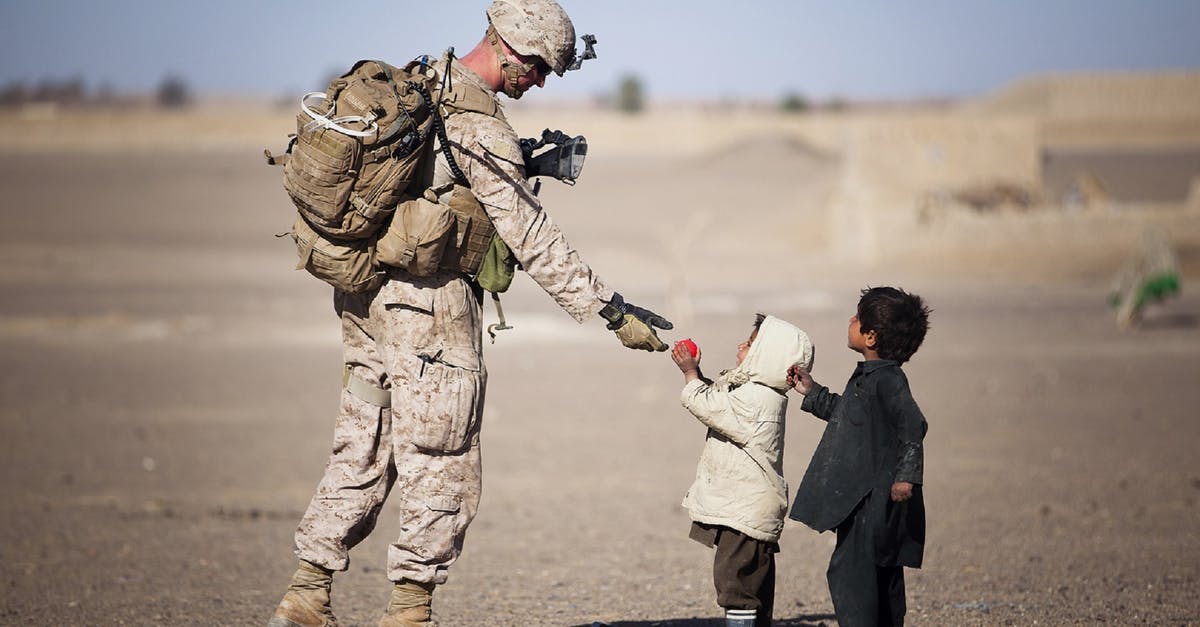 Does retraining a soldier in the AWC also reroll their perk? - Soldier Giving Red Fruit on 2 Children during Daytime