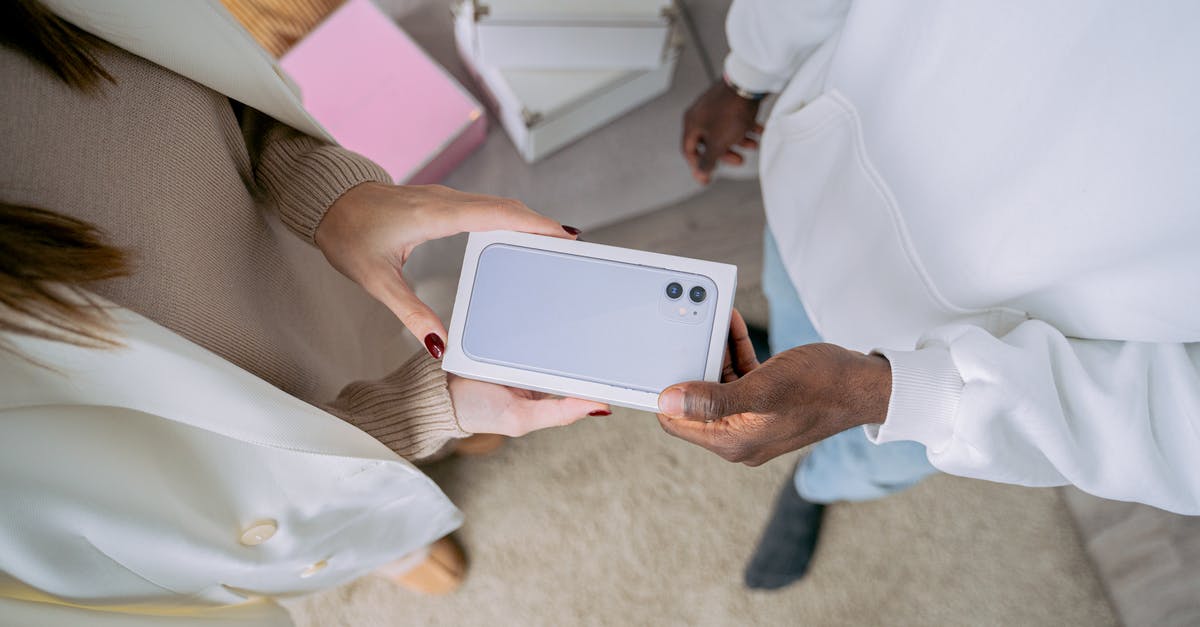 Does scavenging affect Division Tech boxes? - Woman Receiving Box with New Smartphone