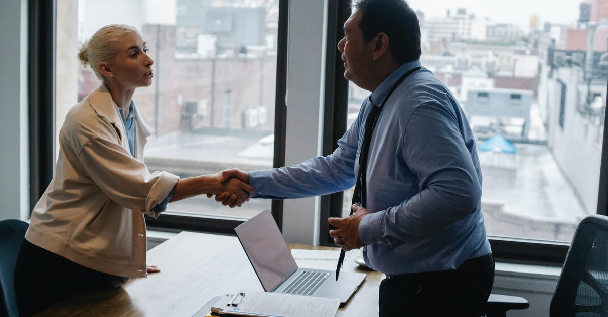 Does the Anti-Bio Beam deal friendly fire? - Young woman shaking hands with boss after business presentation