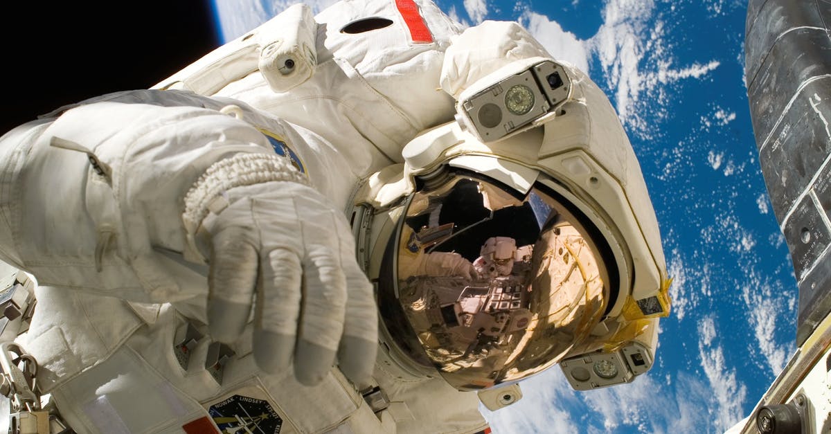 Does world size affect multiplayer lag? - This picture shows an american astronaut in his space and extravehicular activity suite working outside of a spacecraft. In the background parts of a space shuttle are visible. In the far background of the picture planet earth with it's blue color and whi