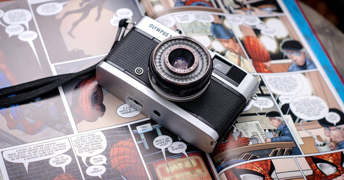 Dynamax Adventures - shiny odds connected to story completion? - From above of opened comics magazine with vintage photo camera placed on top