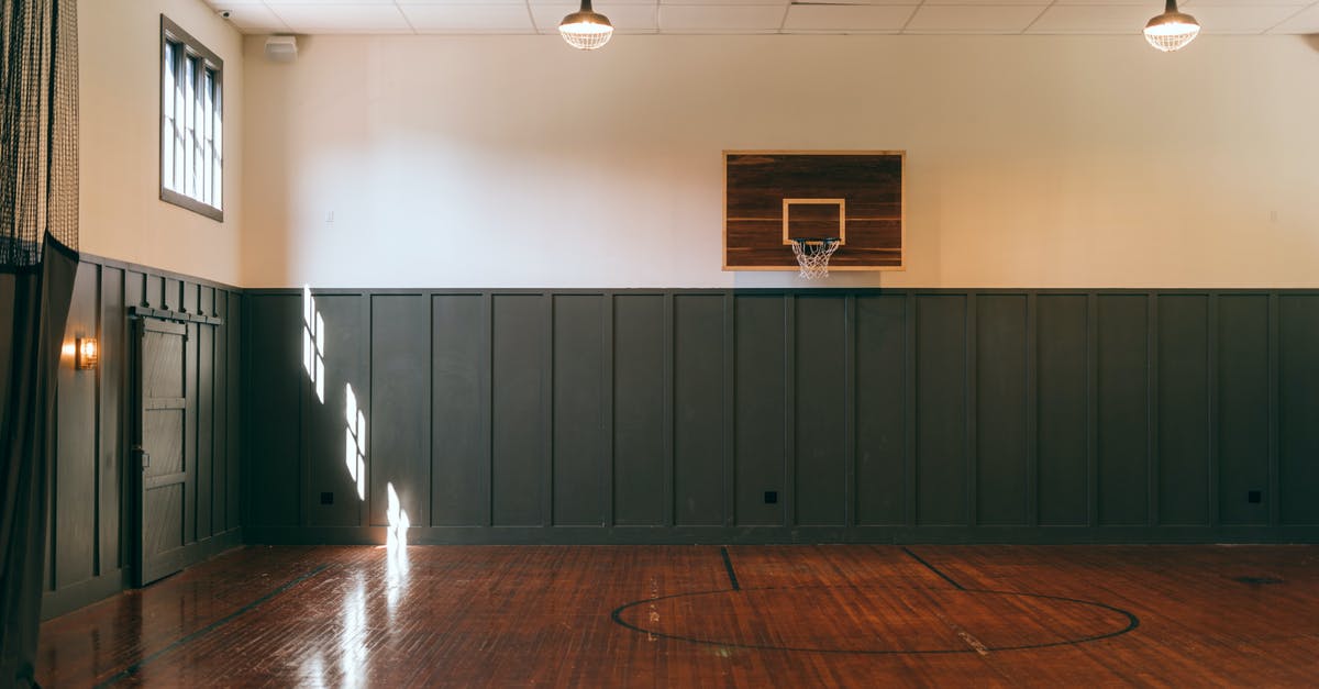 Entering the Training Complex in Valorant Tutorial - Interior of indoors basketball court in sports center