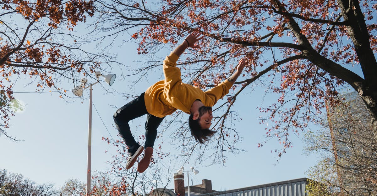 Fall Guys on Low Spec [duplicate] - Guy doing backflip in city park