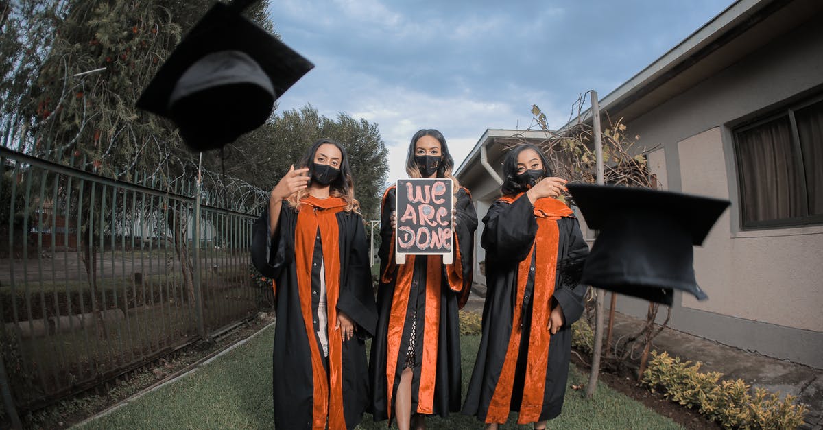 Final Hircine Totem Quest Glitch - 2 Women in Academic Dress Standing on Green Grass Field