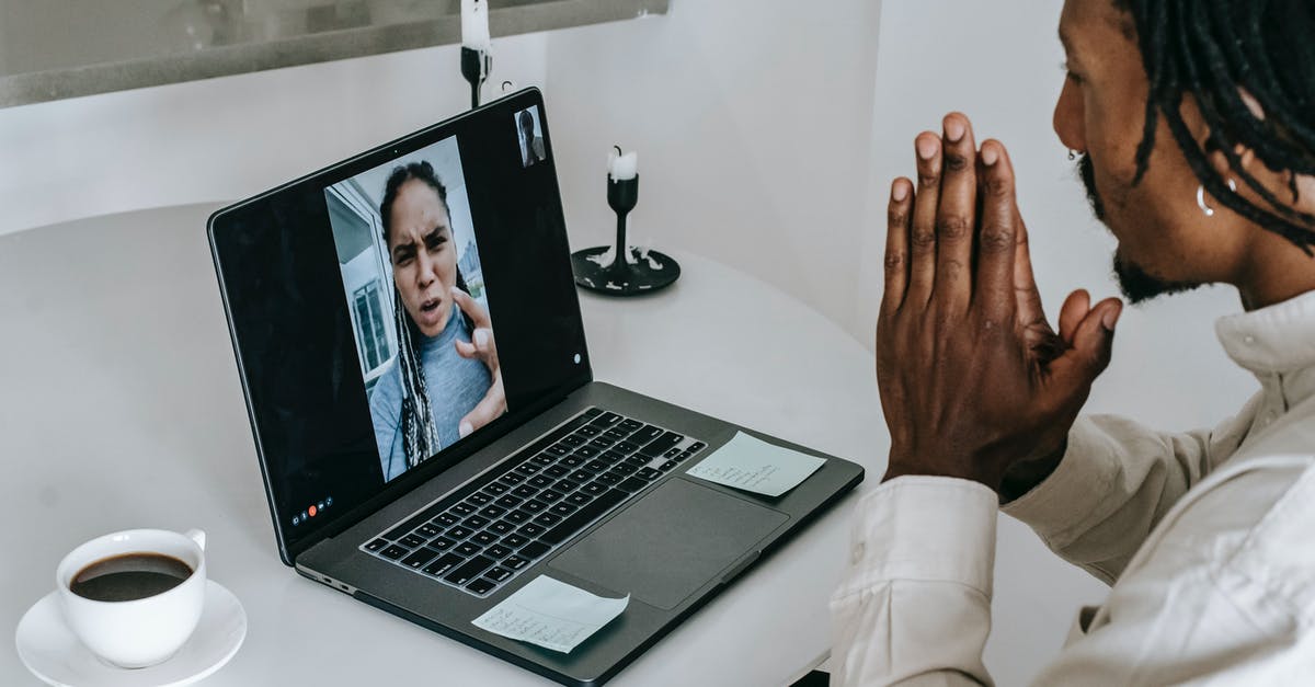 Freeze issue when trying to use Nvidia - Anxious misunderstanding African American couple having video call via laptop and arguing emotionally while going through relationships crisis