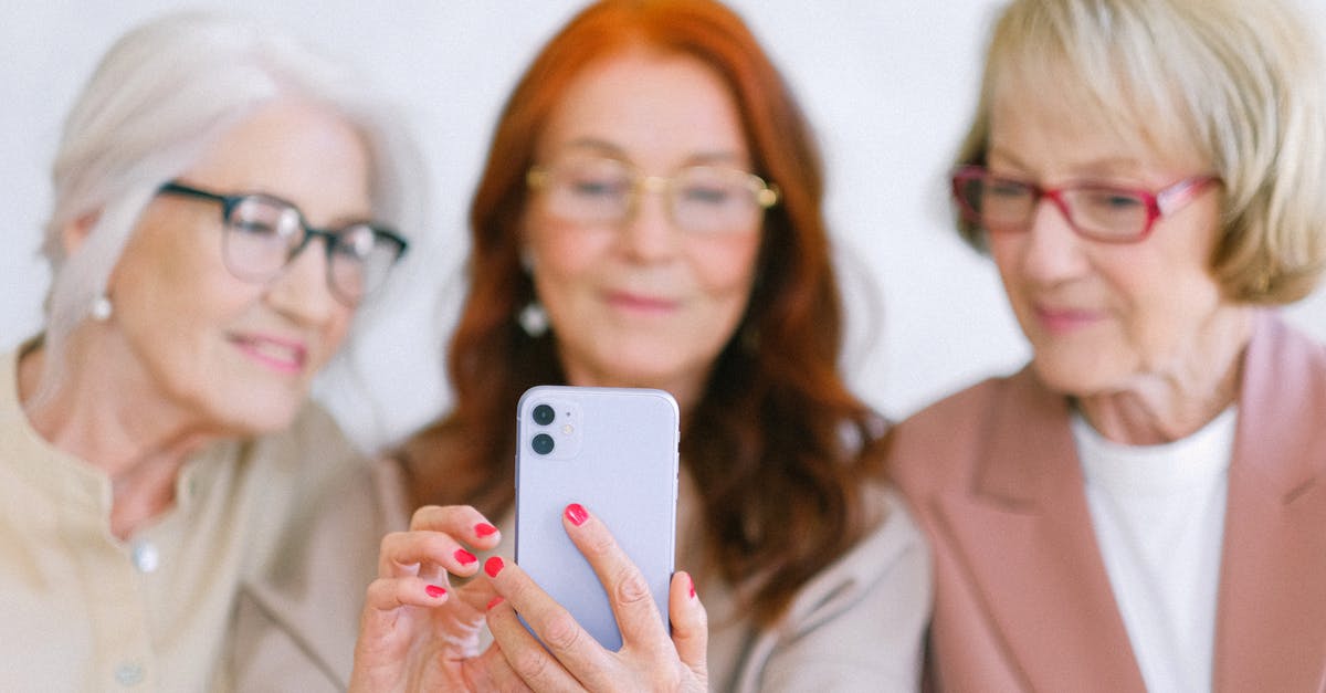 Geopolitical Maps in Elder Scrolls Over Time - Senior women using smartphone while surfing internet