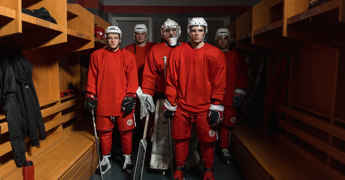 Get all players that aren't on two teams? - Hockey Team Standing in the Locker Room