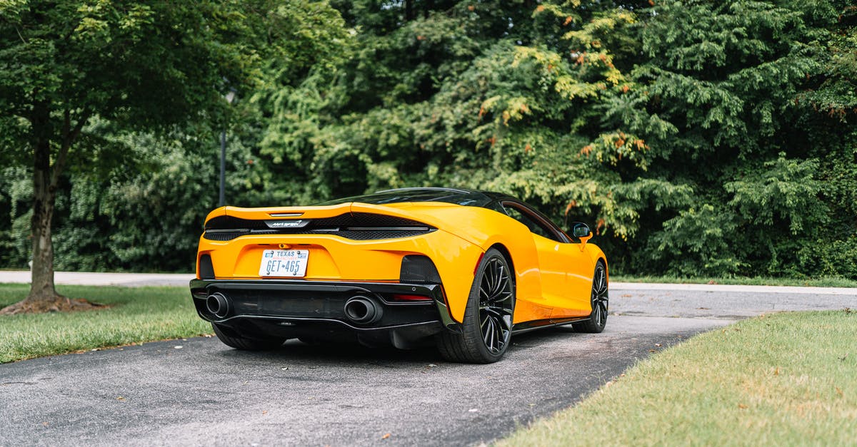 GT 710 Overclocking - A Yellow 2021 McLaren GT Parked on a Driveway