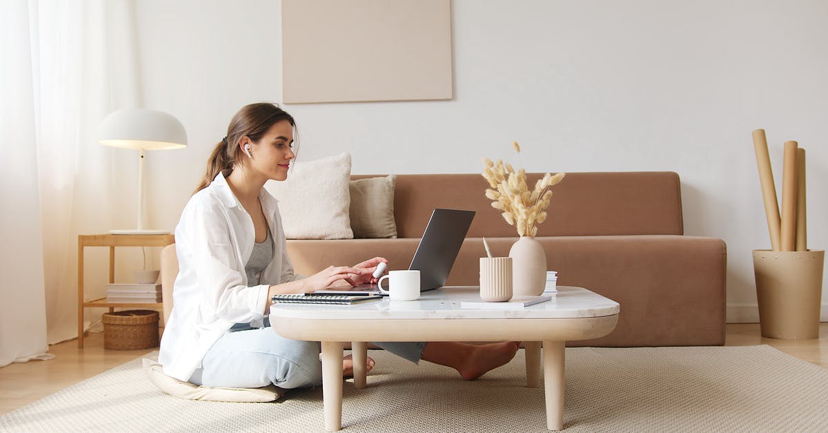 GTA not using full GPU capacity - Content woman using laptop on floor