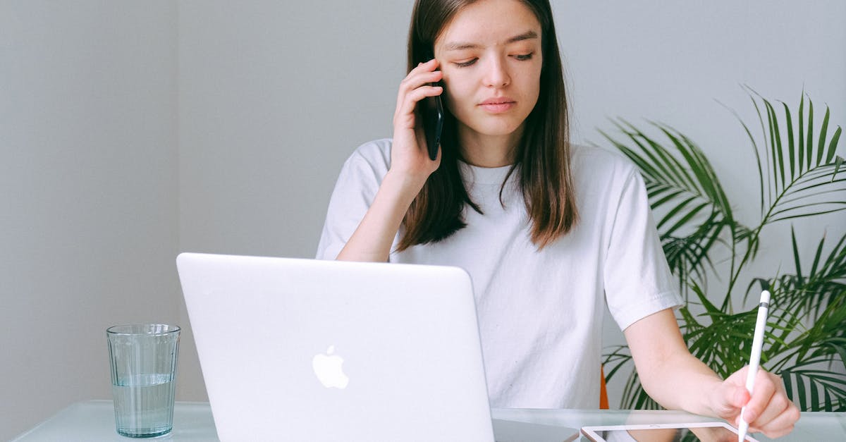 How are Half-Life 2 and Half-Life: Alyx timelines connected? - Woman in White Crew Neck T-shirt Using Silver Macbook