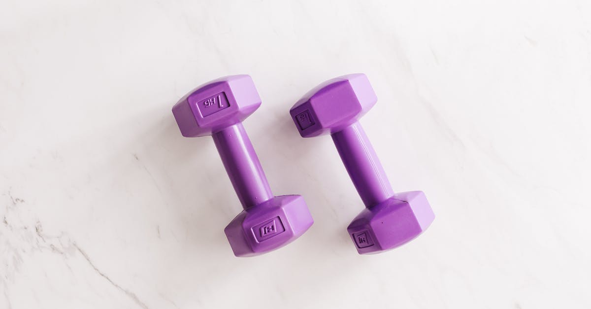 How are PP scores from 'Top Ranks' weighted? - Purple all cast dumbbells on marble surface