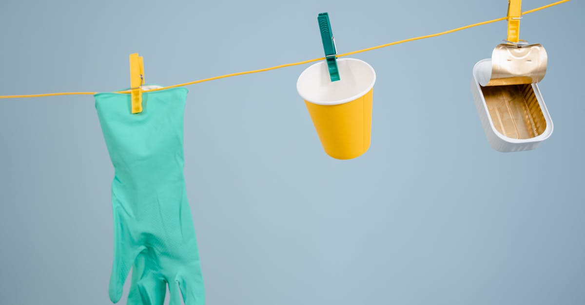 How can I complete this quest? - Teal Rubber Gloves Hanging Beside Yellow Cup and Can