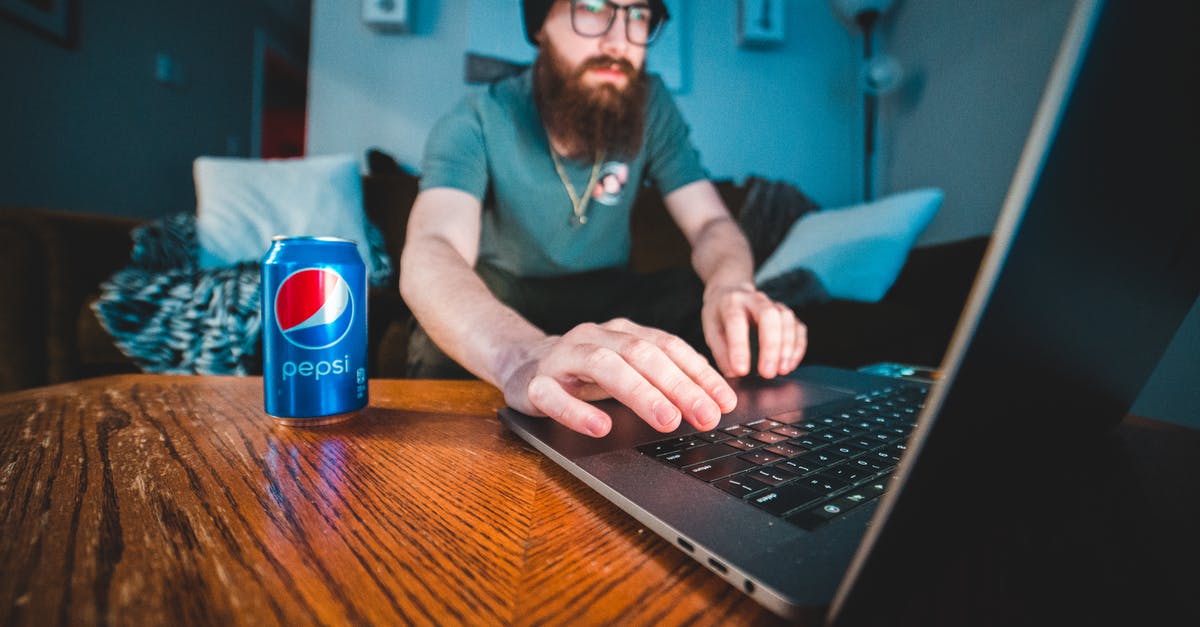 How can I die from falling? - Man in Blue Polo Shirt Using Black Laptop Computer