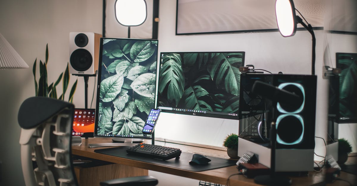 How can I exit to desktop from in-game? - Black Flat Screen Computer Monitor on White Wooden Desk