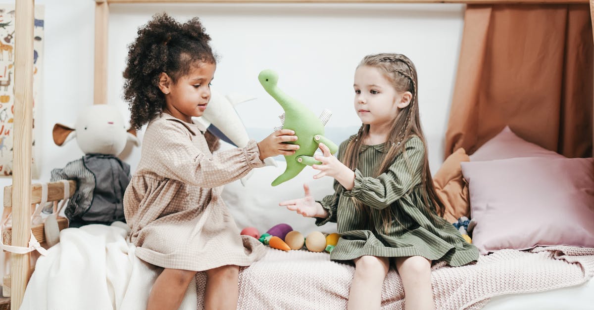 How can I keep baby dinosaurs alive? - Siblings Playing A Green Plush Toys