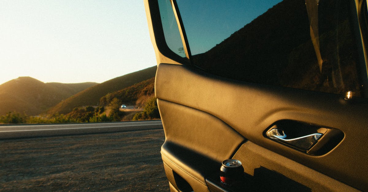 How can I make an automatic door that opens for me only? - Car With Opened Door Near Road How can I make an automatic door that opens for me only? - Car With Opened Door Near Road