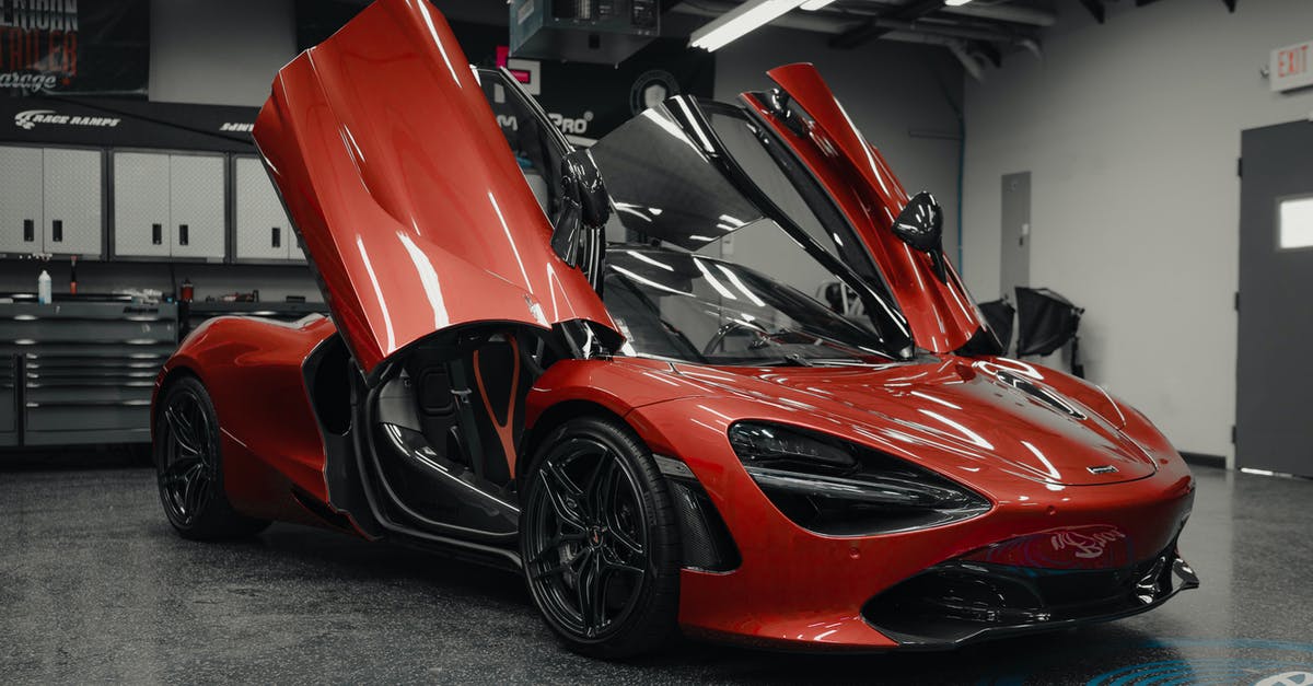 How can I make an automatic door that opens for me only? - Luxury sports red car in showing room How can I make an automatic door that opens for me only? - Luxury sports red car in showing room