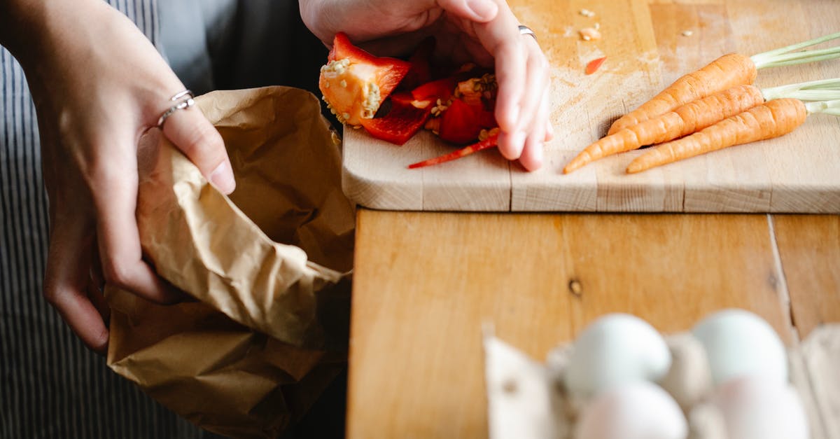 How do I add Counter-Strike (TTT) weapons to Half-Life 2 Base? - Unrecognizable female putting seeds of red bell pepper from cutting board into carton package while cooking at counter with carrots and eggs