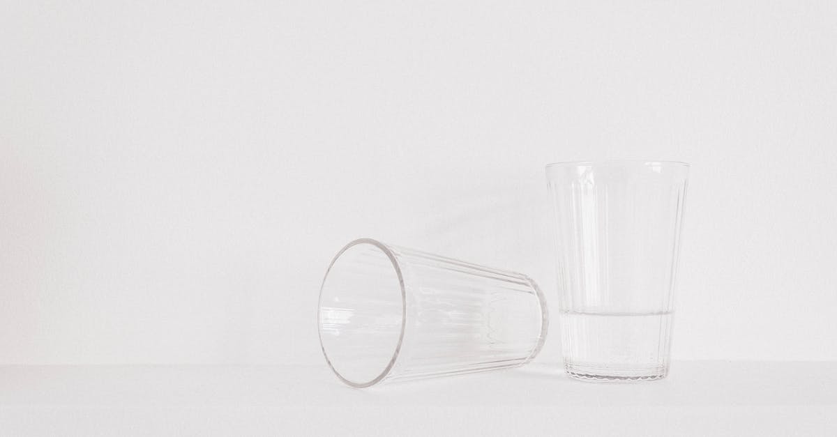 How do I clean items? - Two Clear Drinking Glasses on Table