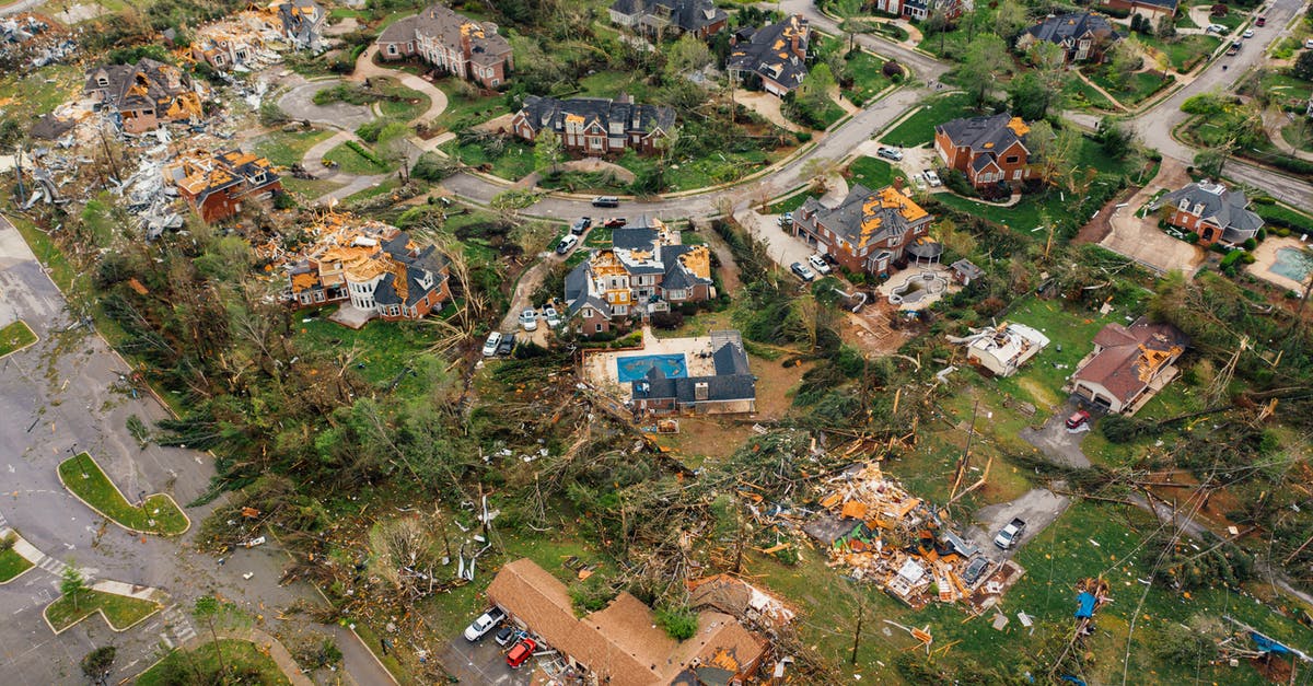 How do I dismantle a power plant? [duplicate] - Dramatic view of village houses damaged by thunderstorm