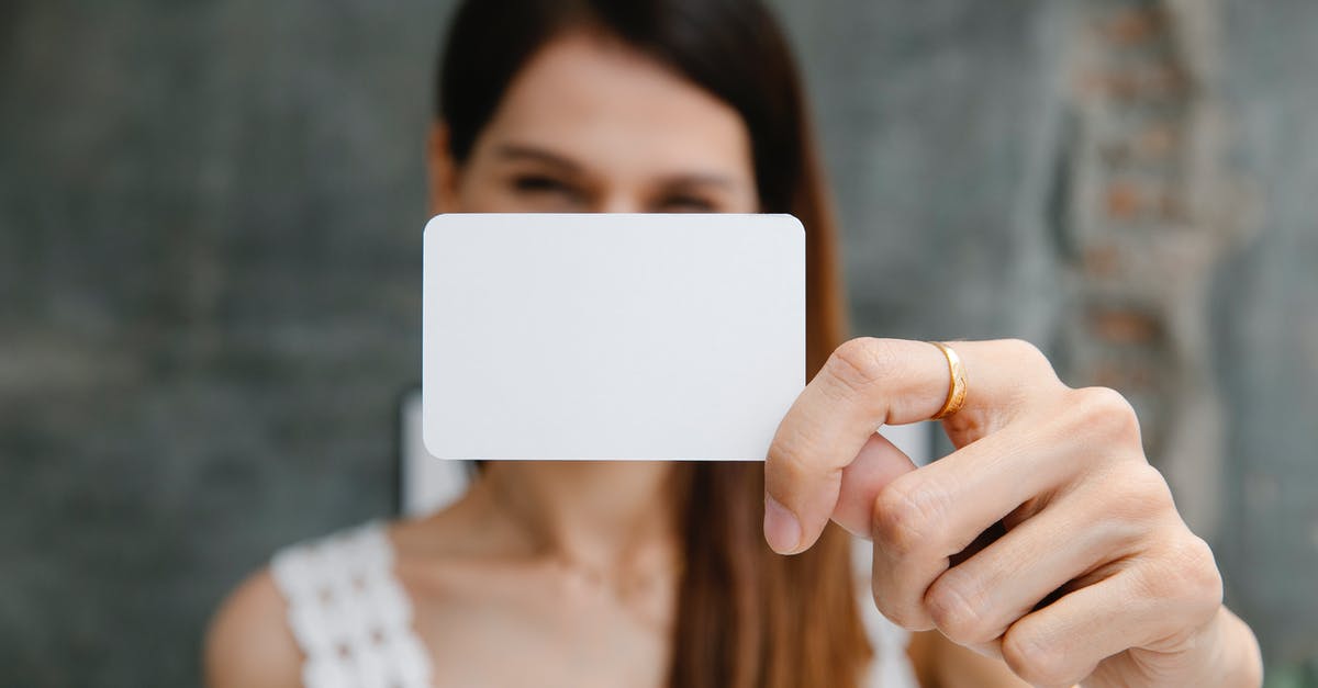 How do I do a rectangular selection for the /tp command? - Young blurred female showing white blank business card and looking at camera in light room How do I do a rectangular selection for the /tp command? - Young blurred female showing white blank business card and looking at camera in light room