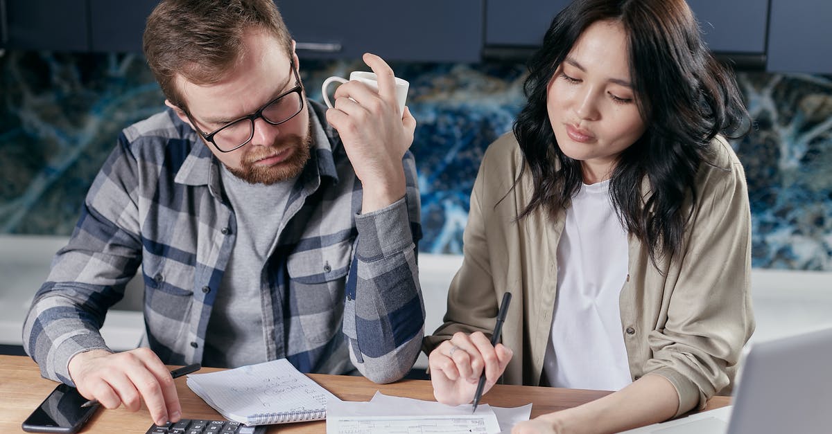 How do I estimate enemy strength? - Couple Looking at their Bills