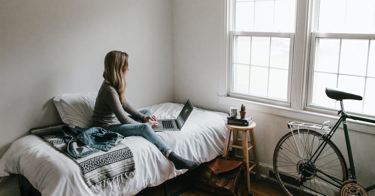 How do I evade earthquake attacks from bosses? - Woman in Gray Shirt Sitting on Bed