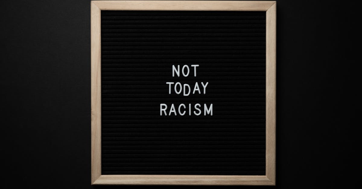 How do I kill Saturn in Borderlands 2? - Overhead view of phrase Not Today Racism on square framed signboard on black background