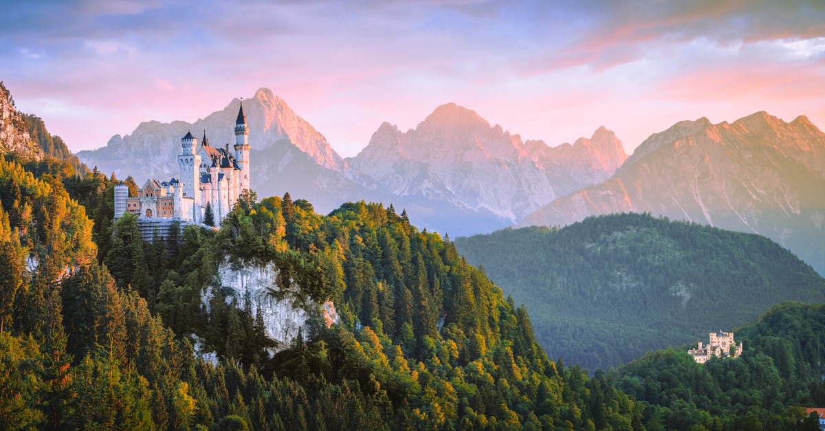 How do I know when it's daytime? - Aerial Photo of Castle Beside Forest