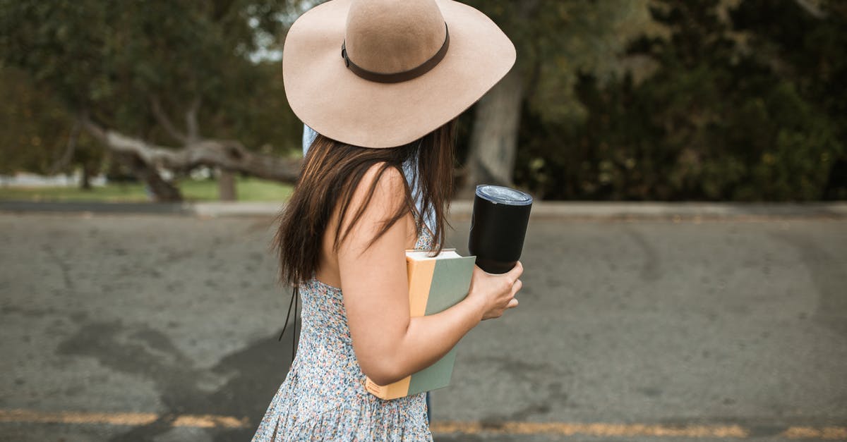 How do I move the mini map to the right side? - Faceless stylish woman with book walking on street