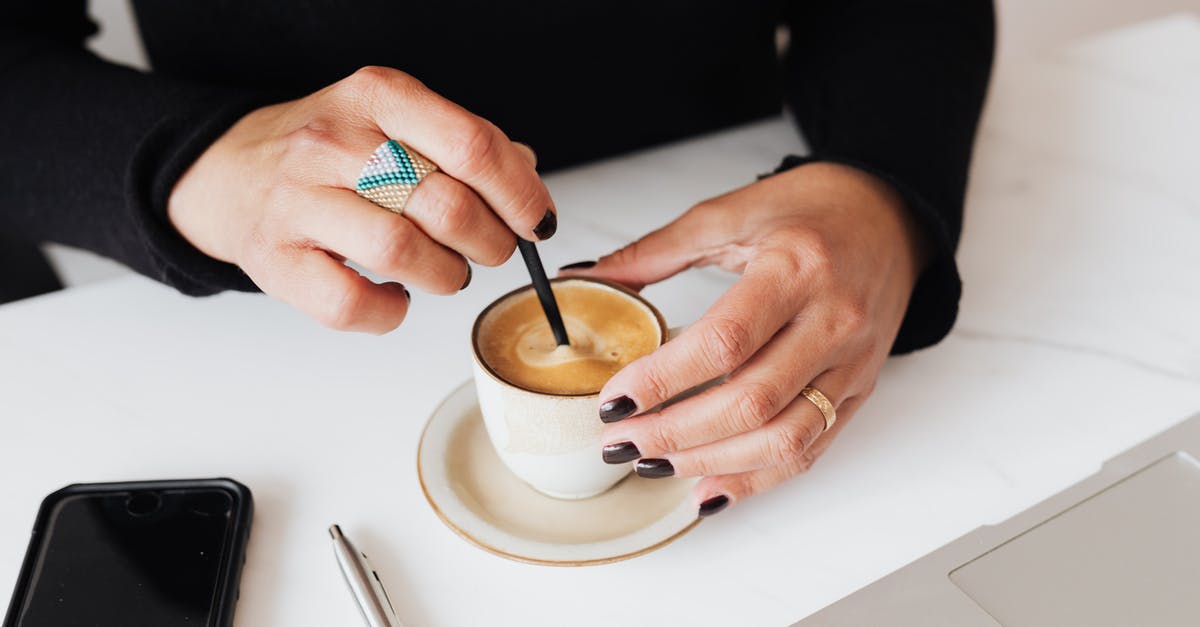 How do you backflip in Elden Ring (with PC controls)? - Crop woman with stylish ring stirring hot espresso