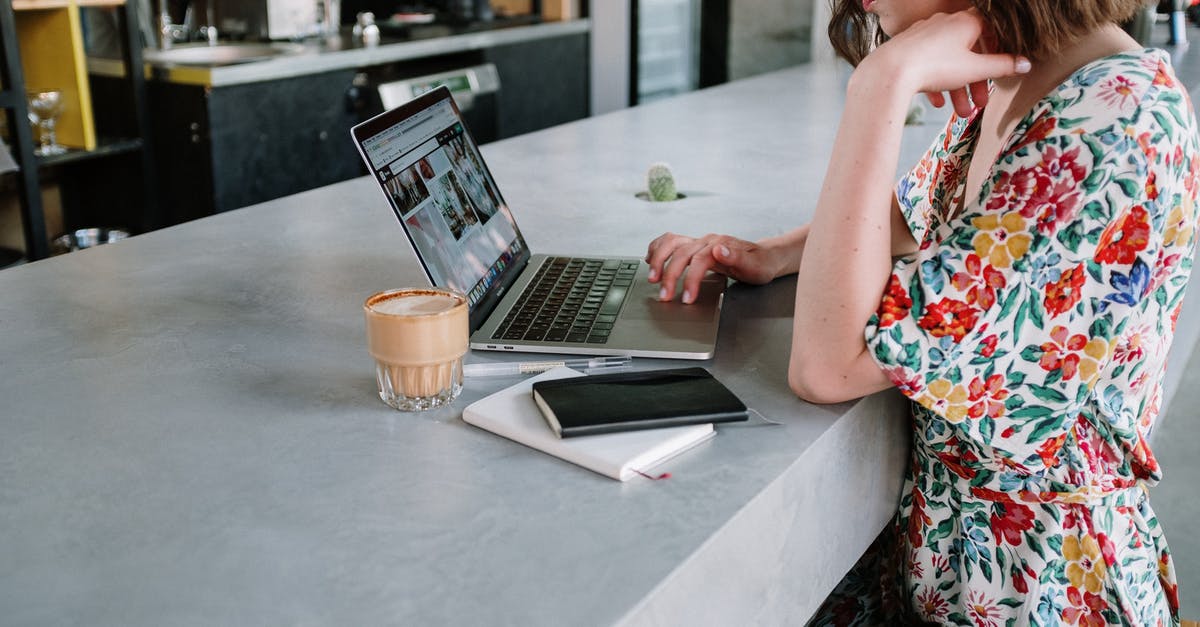 How do you increase the Limit Break bar? - Woman in Orange and White Floral Dress Using Macbook Pro