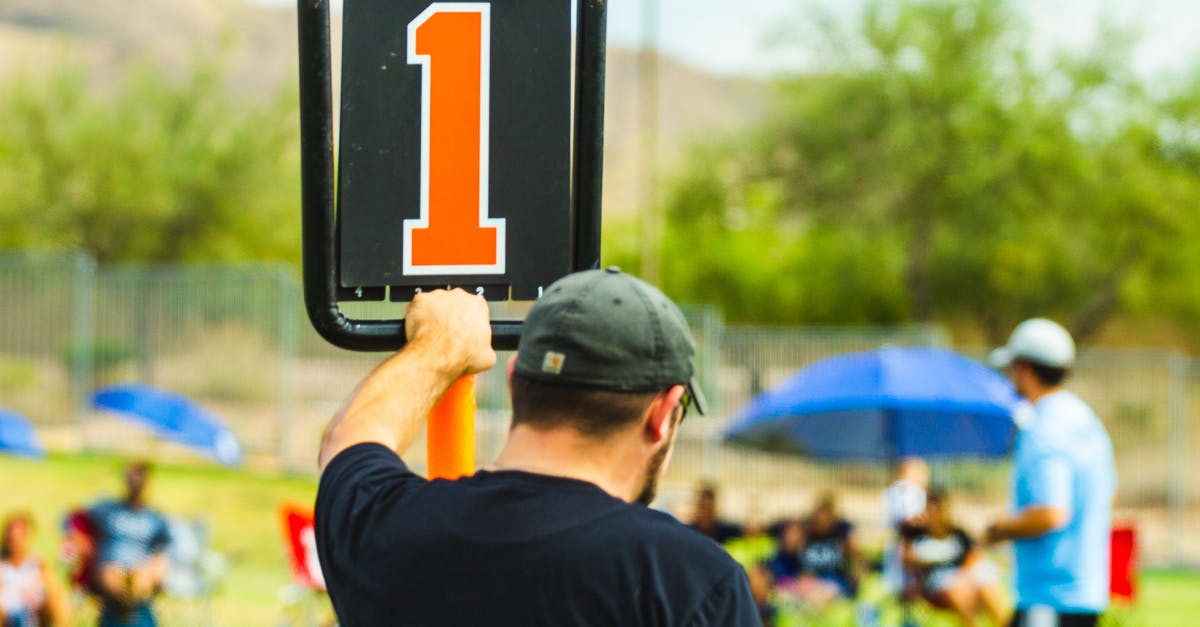 How do you test if score A is larger than Score B (different scoreboard objectives)? - Unrecognizable man near scoreboard during sports competition How do you test if score A is larger than Score B (different scoreboard objectives)? - Unrecognizable man near scoreboard during sports competition