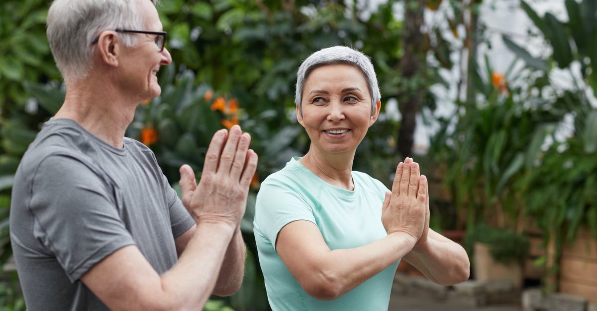 How does difficulty level affect my exercise? - Couple Smiling While Looking at Each Other