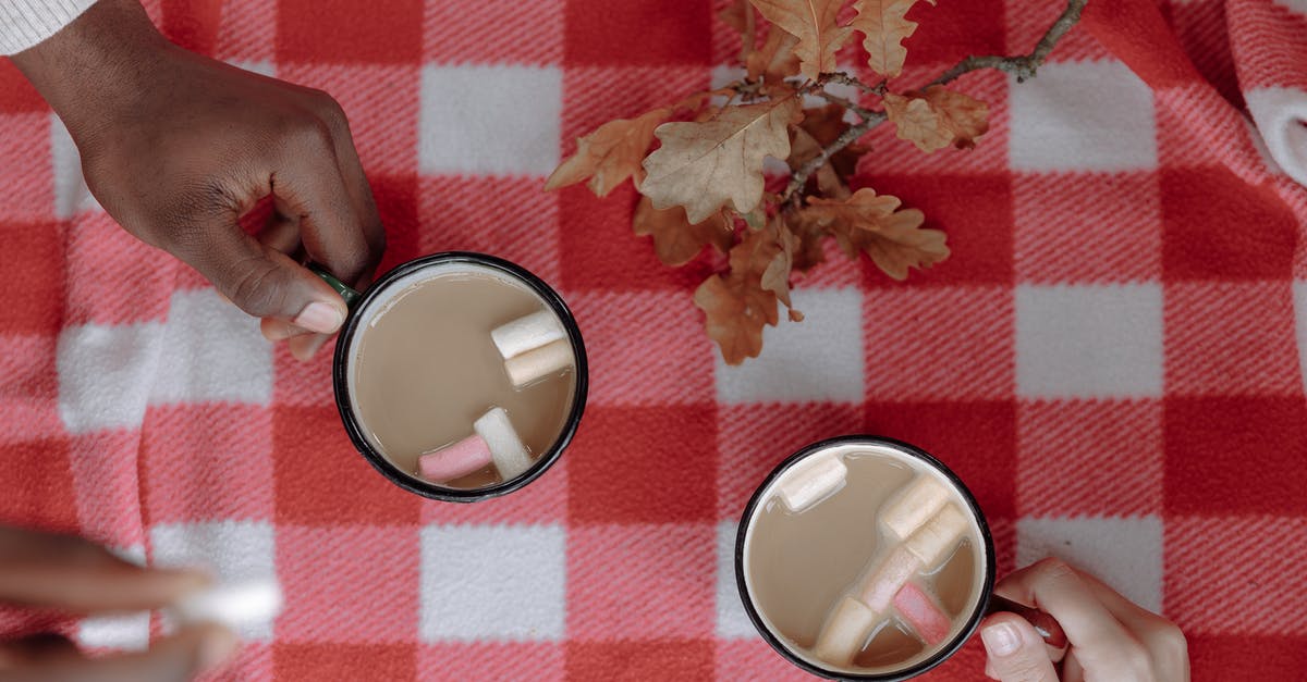 How does one tell what gender a Fallen is? - White Ceramic Mug on Red and White Checkered Textile