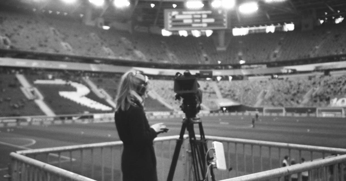 How does the Arena work? - Female camera operator working at stadium