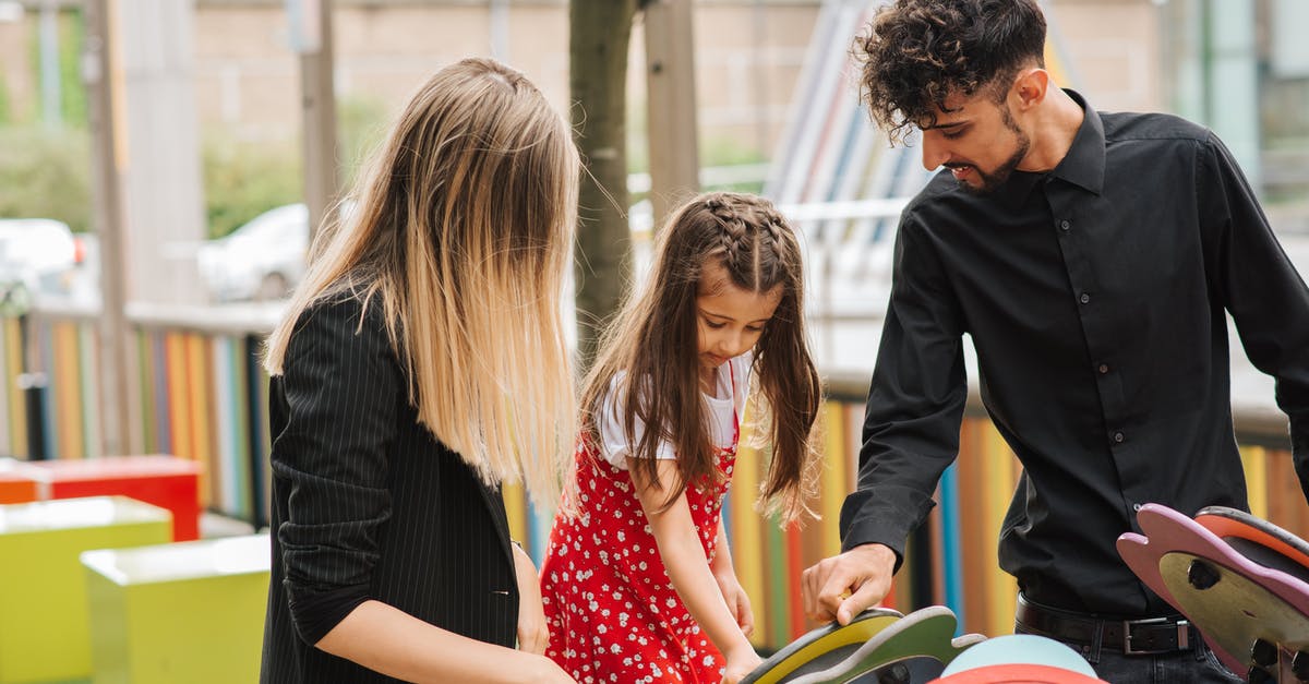 How long is the 60 days of Game Time Cards? - Little girl playing on playground with support of mother and father in casual clothes in summer day