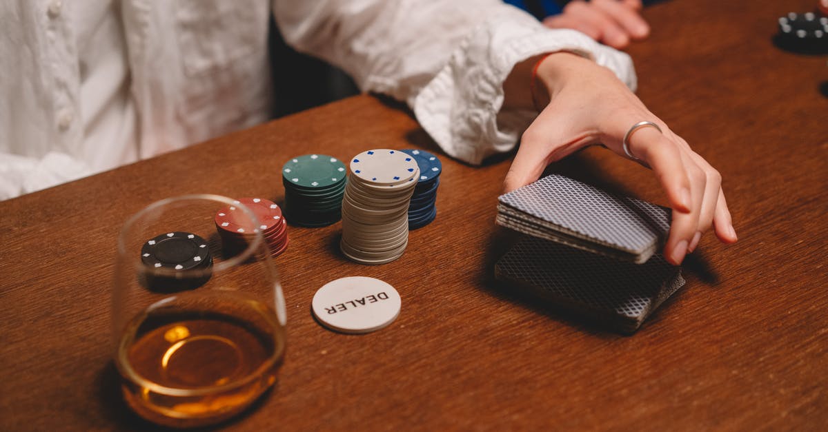 How long is the 60 days of Game Time Cards? - Person Wearing White Long Sleeve Shuffling the Cards