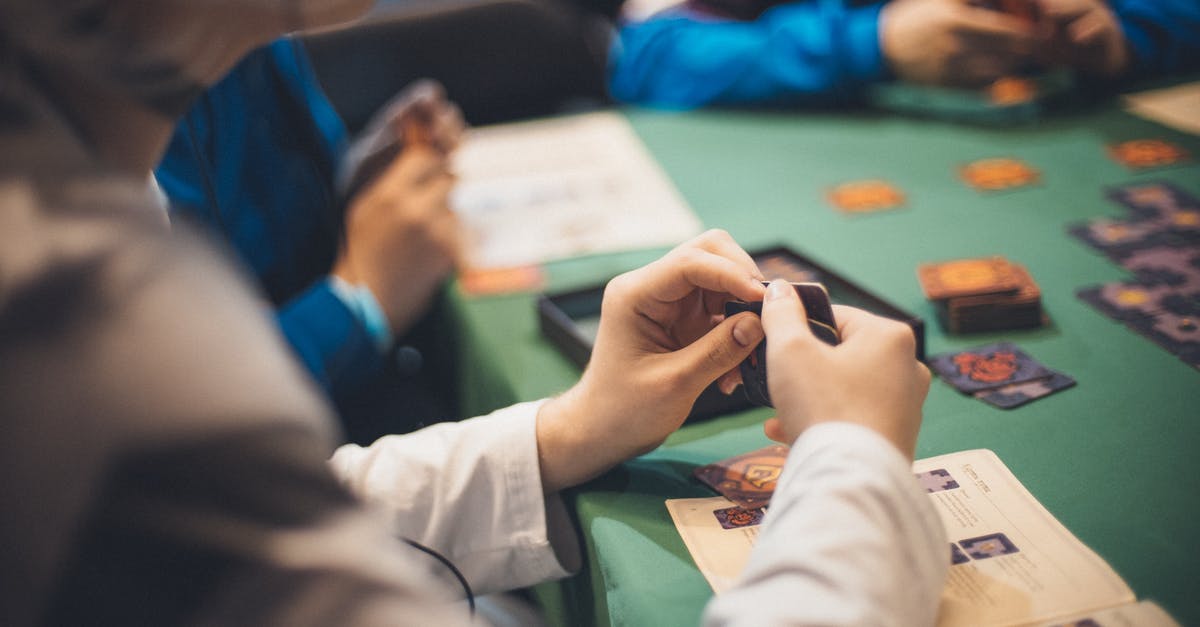 How long is the 60 days of Game Time Cards? - Crop people playing cards at table