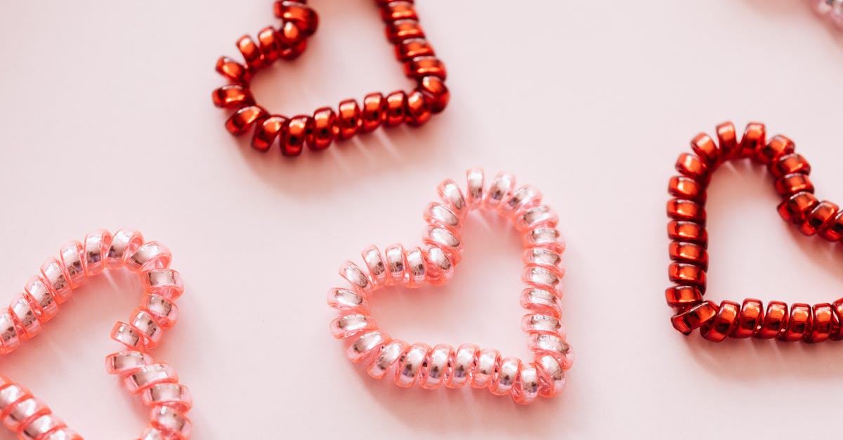 How many accounts of the Battle of Red Mountain are there? - Colorful hair ties in shape of hearts on pink surface