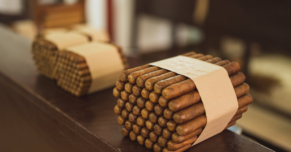 How many heaters should I put in my barns and coops? - Stacks of raw packed cigars in fabric