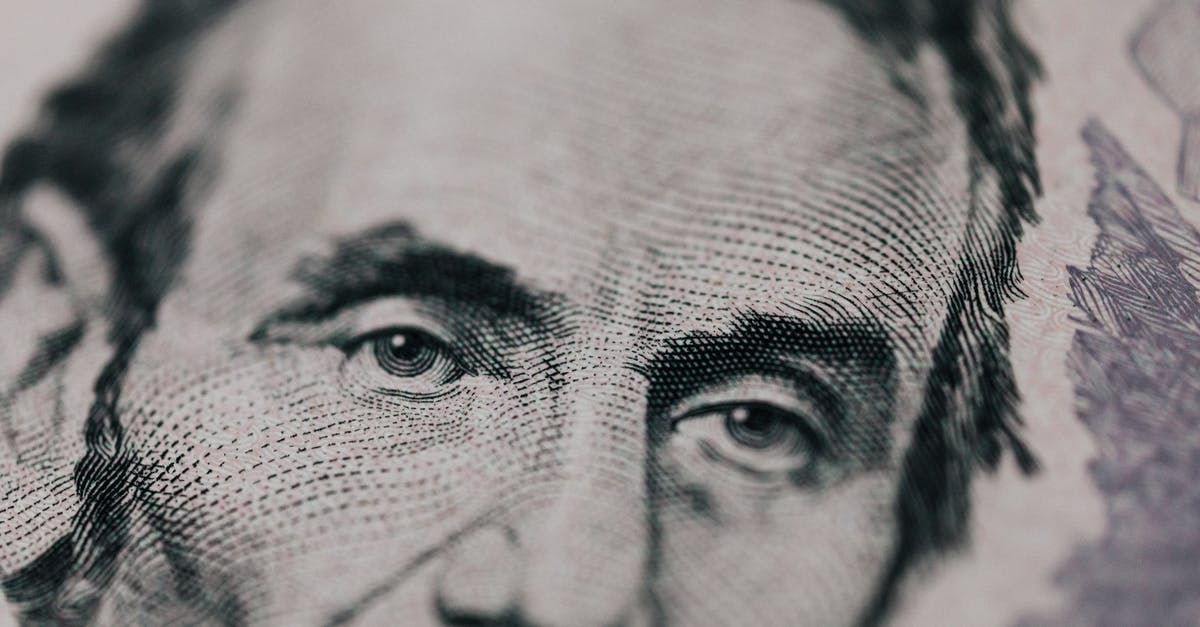 How much do fleet carriers cost in 2021? - Closeup of male American president printed on five dollar bill and looking away pensively