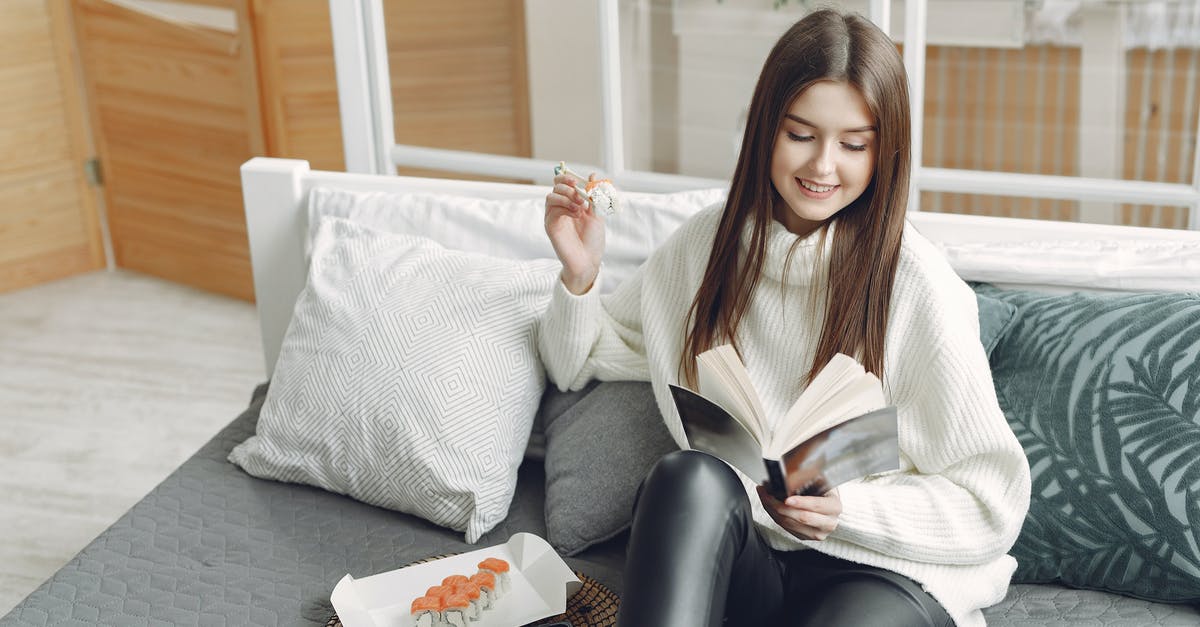 How rare is it to get a Mending book from a villager for 7 emeralds on 3rd roll? - Happy young female reading book on sofa at home How rare is it to get a Mending book from a villager for 7 emeralds on 3rd roll? - Happy young female reading book on sofa at home