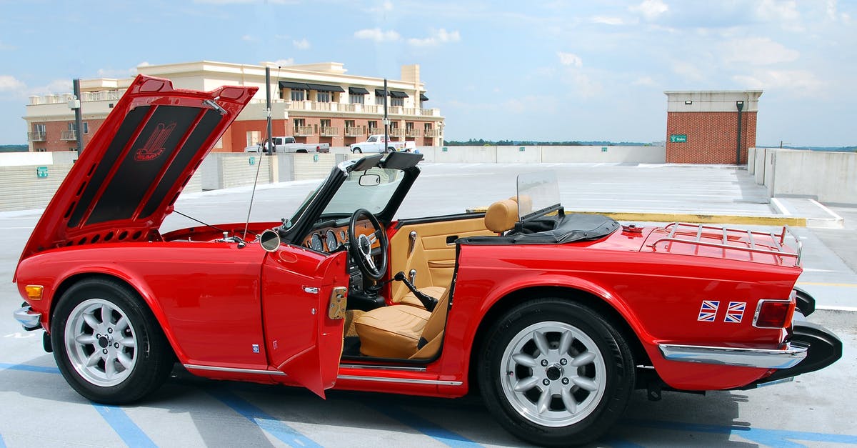 How should foreign consoles be powered in Britain? - Red Convertible Car Park in the Roof Top