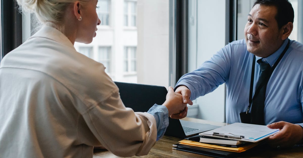 How to achieve reentry with bigger crafts? - Ethnic businessman shaking hand of applicant in office